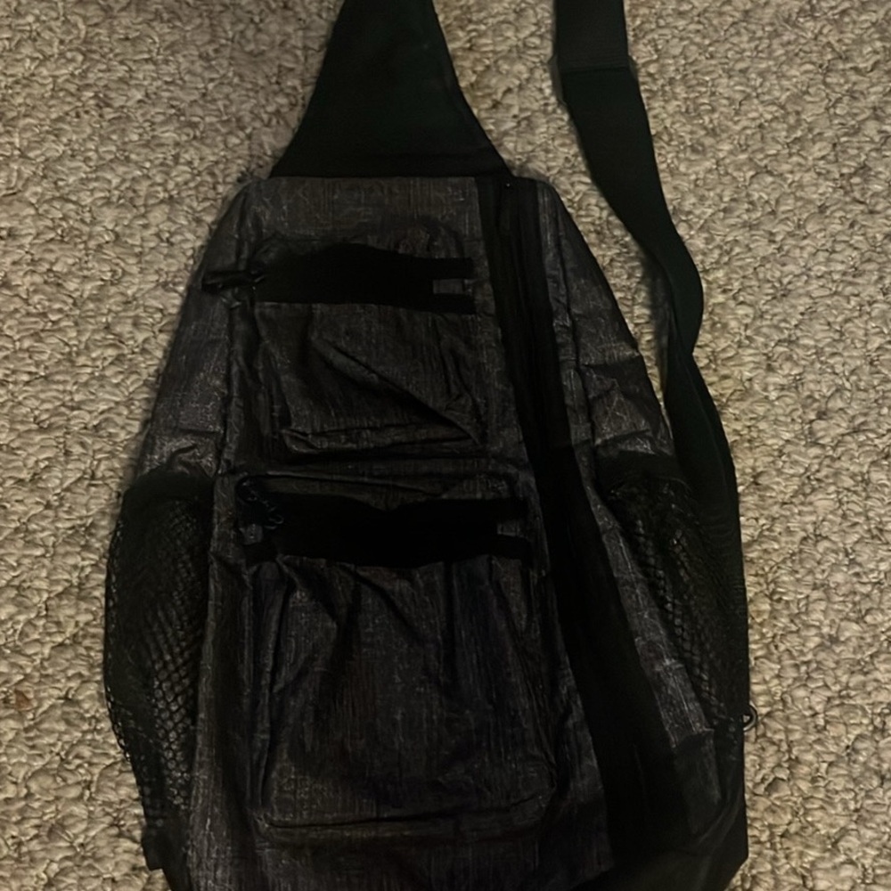 Black crosshatch Thirty-one Sling Backpack